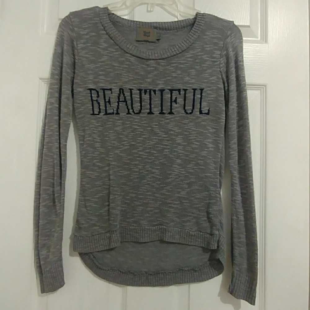 Gray sweater new w/o tags.